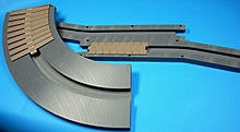 Custom machined plastic conveyor parts example trax