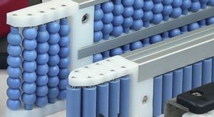 accumulation rollers for conveyor transfer modules and plates